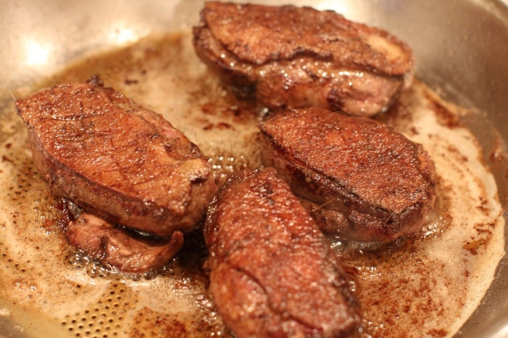 searing the wild duck breasts