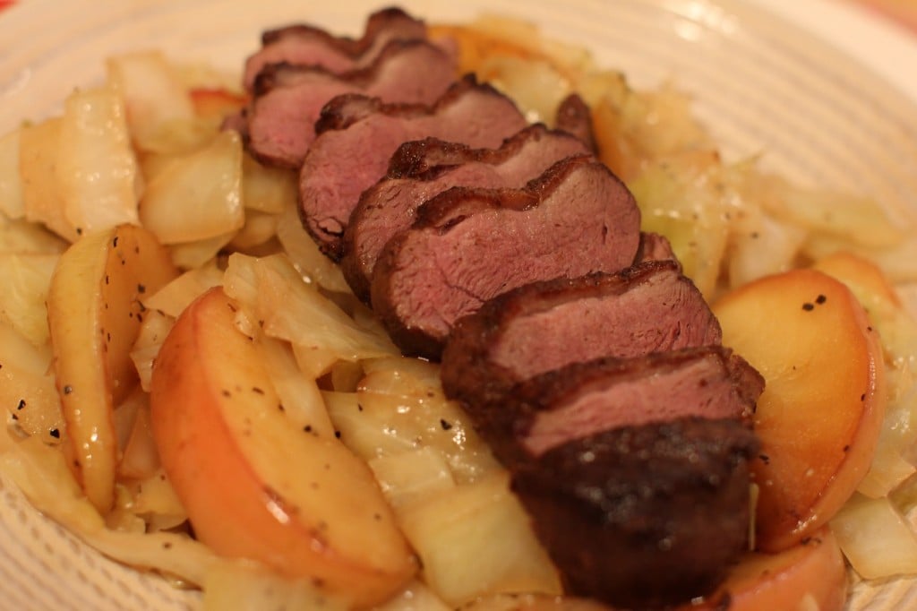seared duck breast with braised apples and cabbage