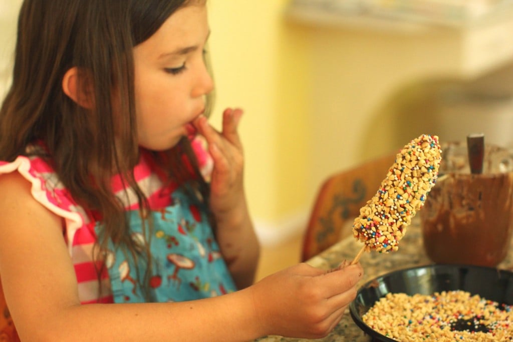 licking fingers, chocolate banana pops