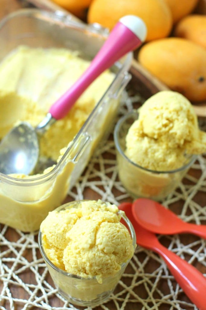 coconut mango ice cream, scooped from dish