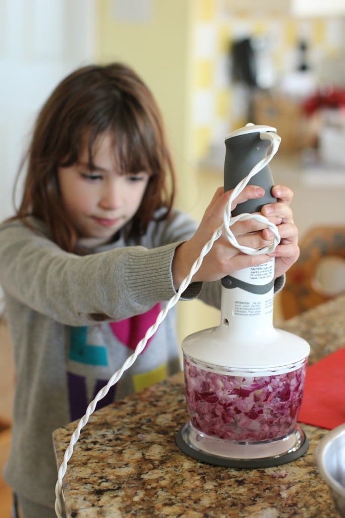 Cooking with Kids: Meredith mincing Onions
