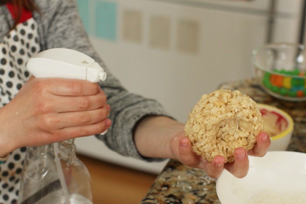 spraying crispy rice Easter egg nests with water