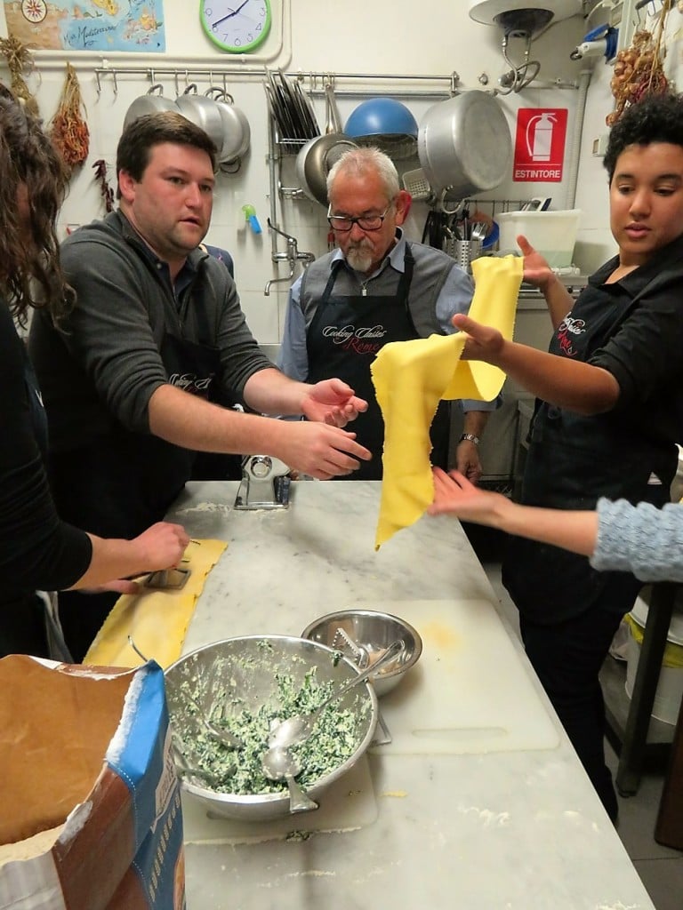 chicken breasts in orange sauce, group effort making ravioli