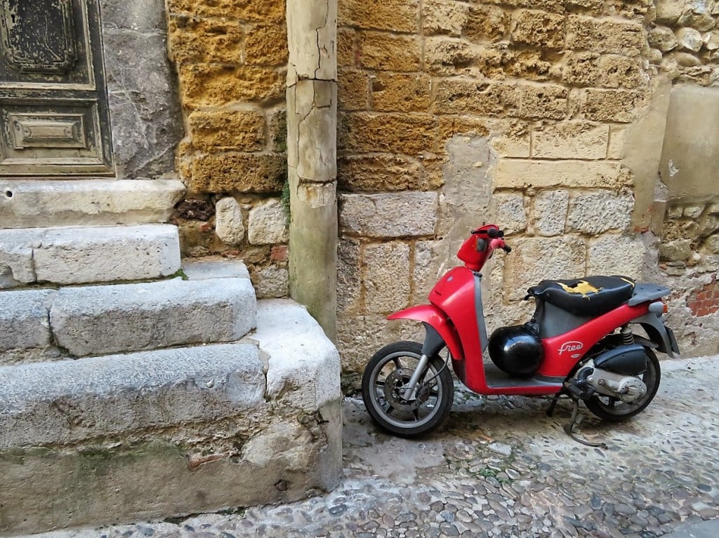 red scooter in Cefalu, Sicily