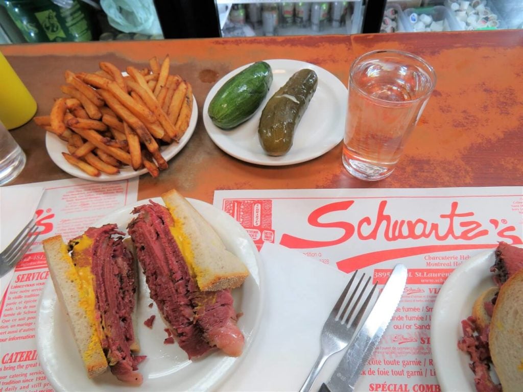 poutine with gluten free gravy; Montreal smoked meat sandwiches at Schwartz's Deli