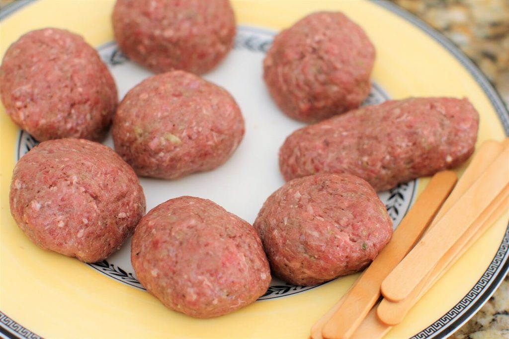 roll the meat into 8 balls for food on a stick burger pops
