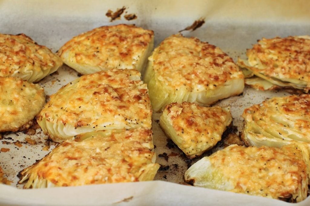 pan full of roasted cabbage slabs
