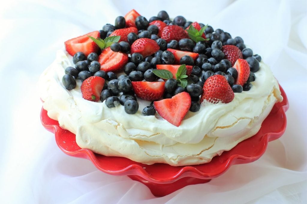 look at all those strawberries and blueberries on that pavlova