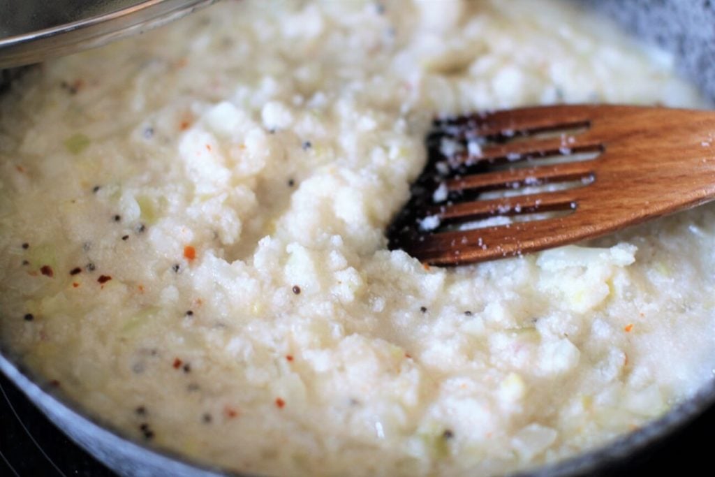 cooking upma, add the water
