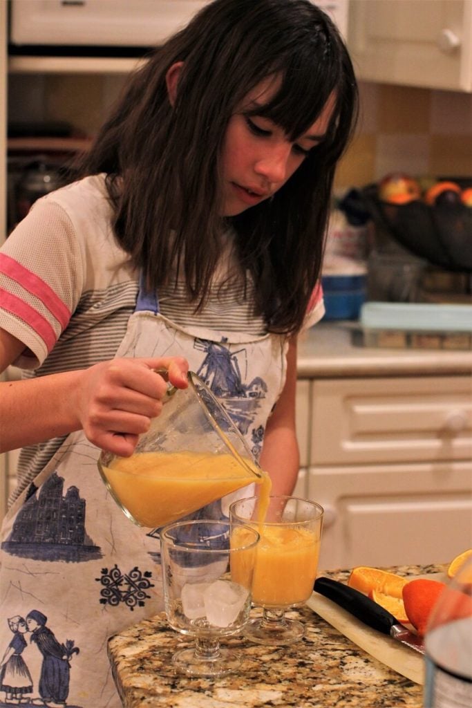 Meredith pouring the orange cream sodas