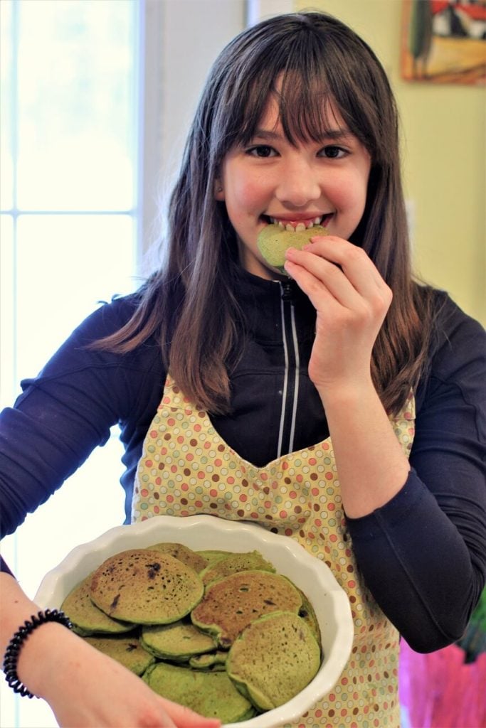 ready to bite into one of the green pancakes; these ones are a chocolate mint version