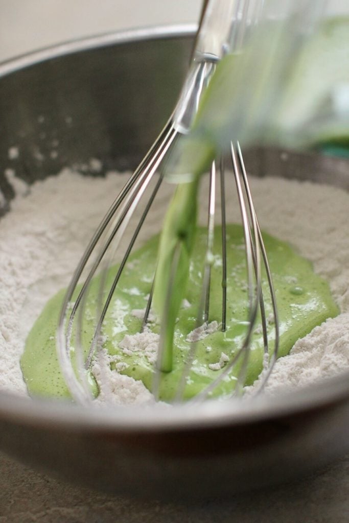 pouring in the green eggs for green pancakes