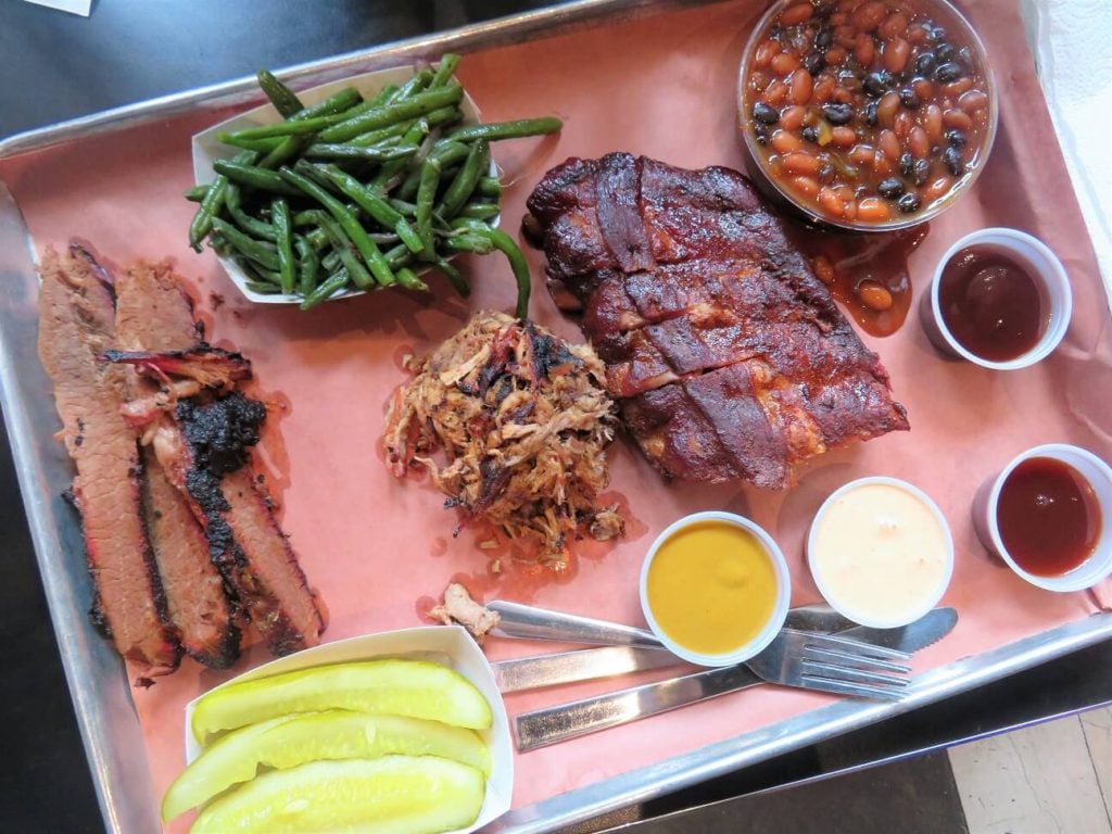 shrimp and grits; a big tray of St. Louis style barbecue at Sugarfire Smokehouse