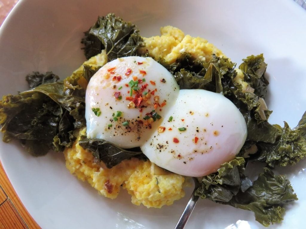 shrimp and grits reminded me of these grits, greens, and eggs I ate in St. Louis