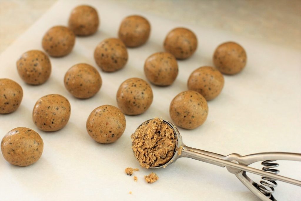 scooping vanilla protein balls
