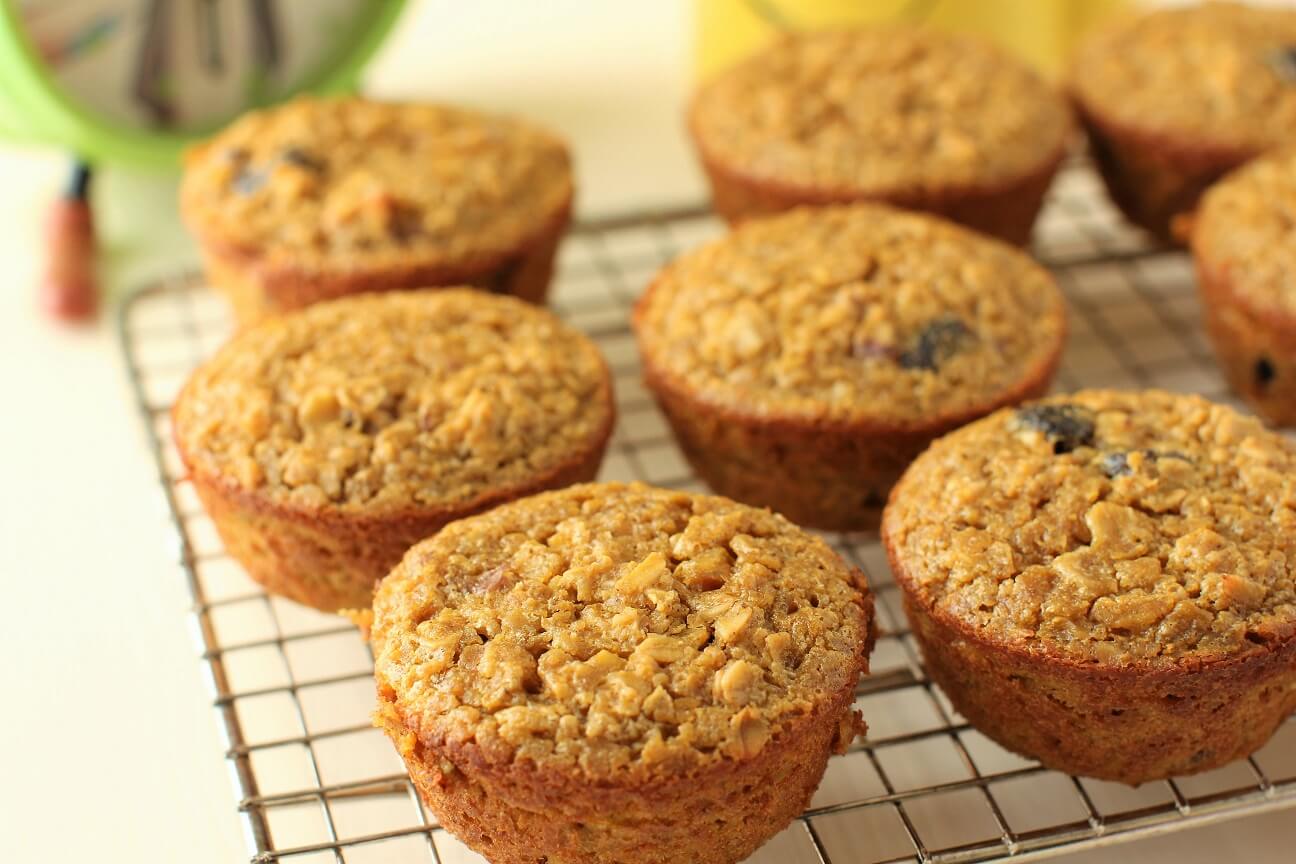 pumpkin baked oatmeal muffins cooling on a rack, ready to devour