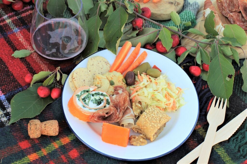 plate full of picnic goodies