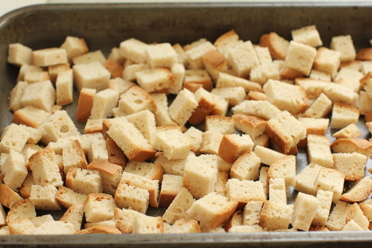 pan of bread cubes drying out.
