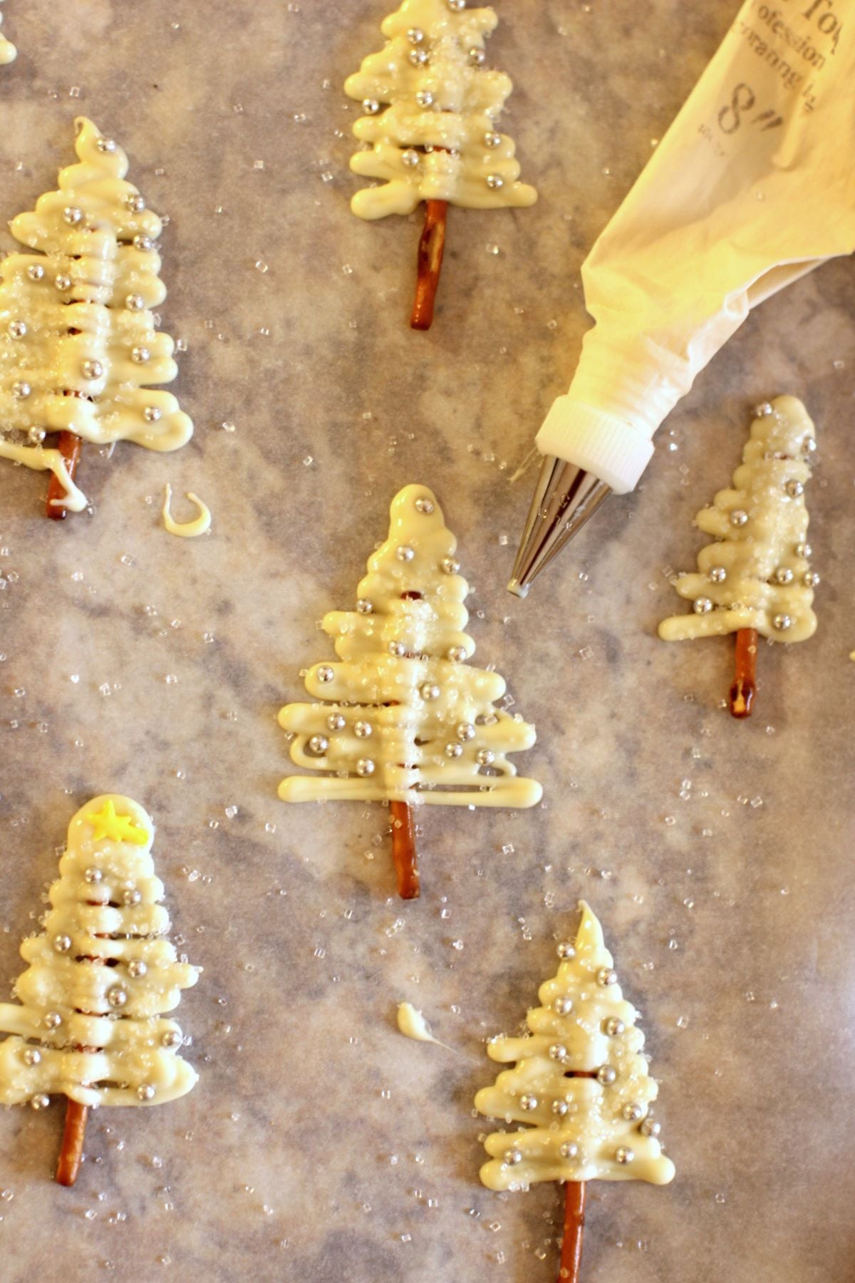sparkling decorated little mini white chocolate trees.