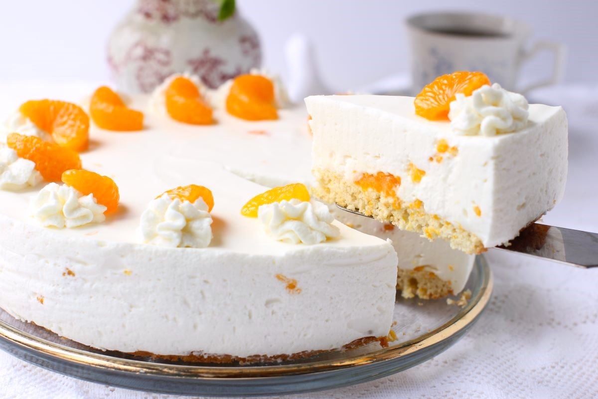 Lifting a slice out of the Mandarin Cream Torte.