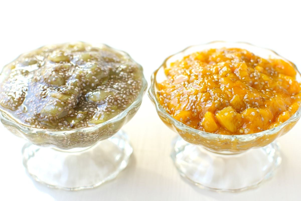 2 small nappies, on the left filled with green grape chia jam and on the right filled with mango chia jam.