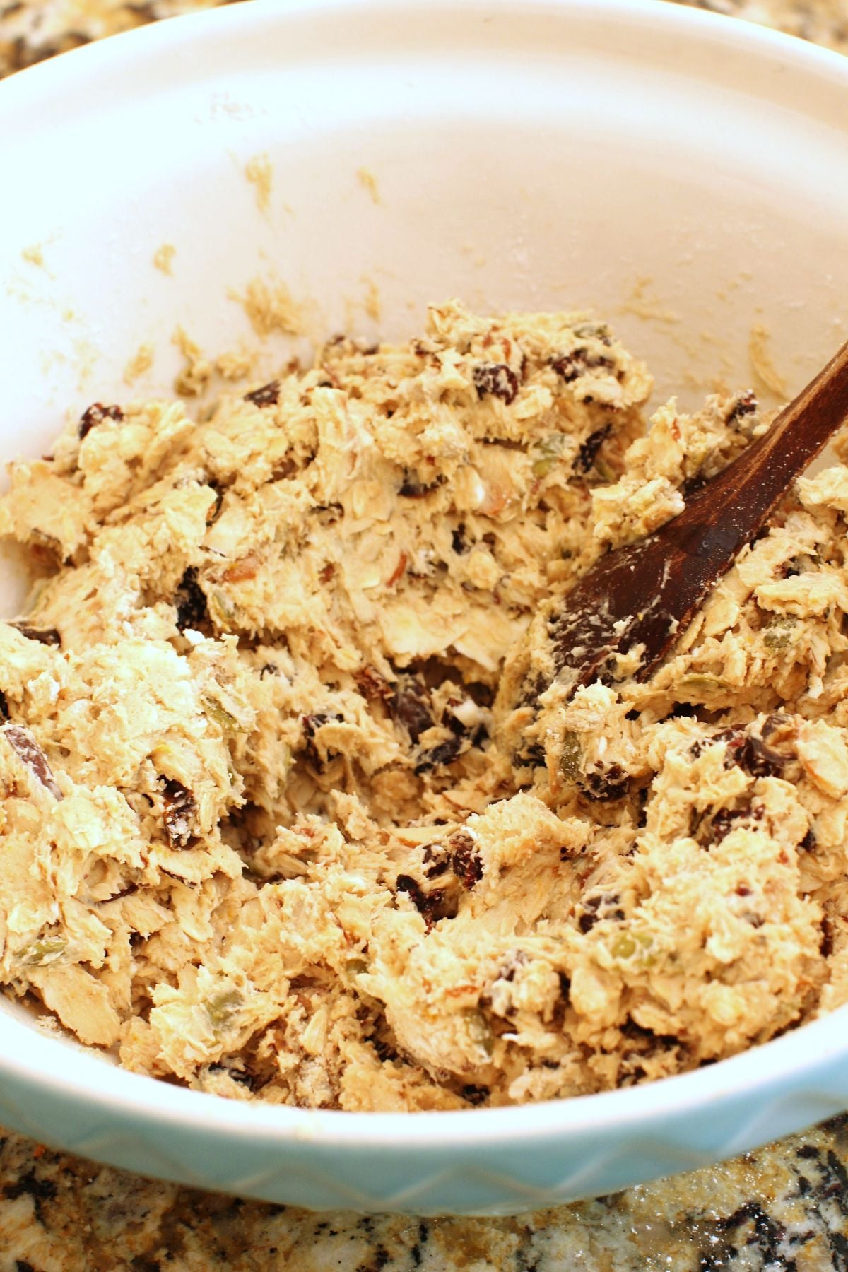 Stirring the scone batter in the big bowl.