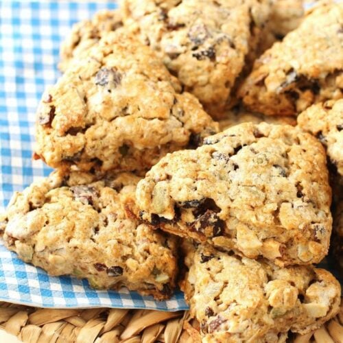 Square thumbnail of granola scones on blue and white checked napkin.
