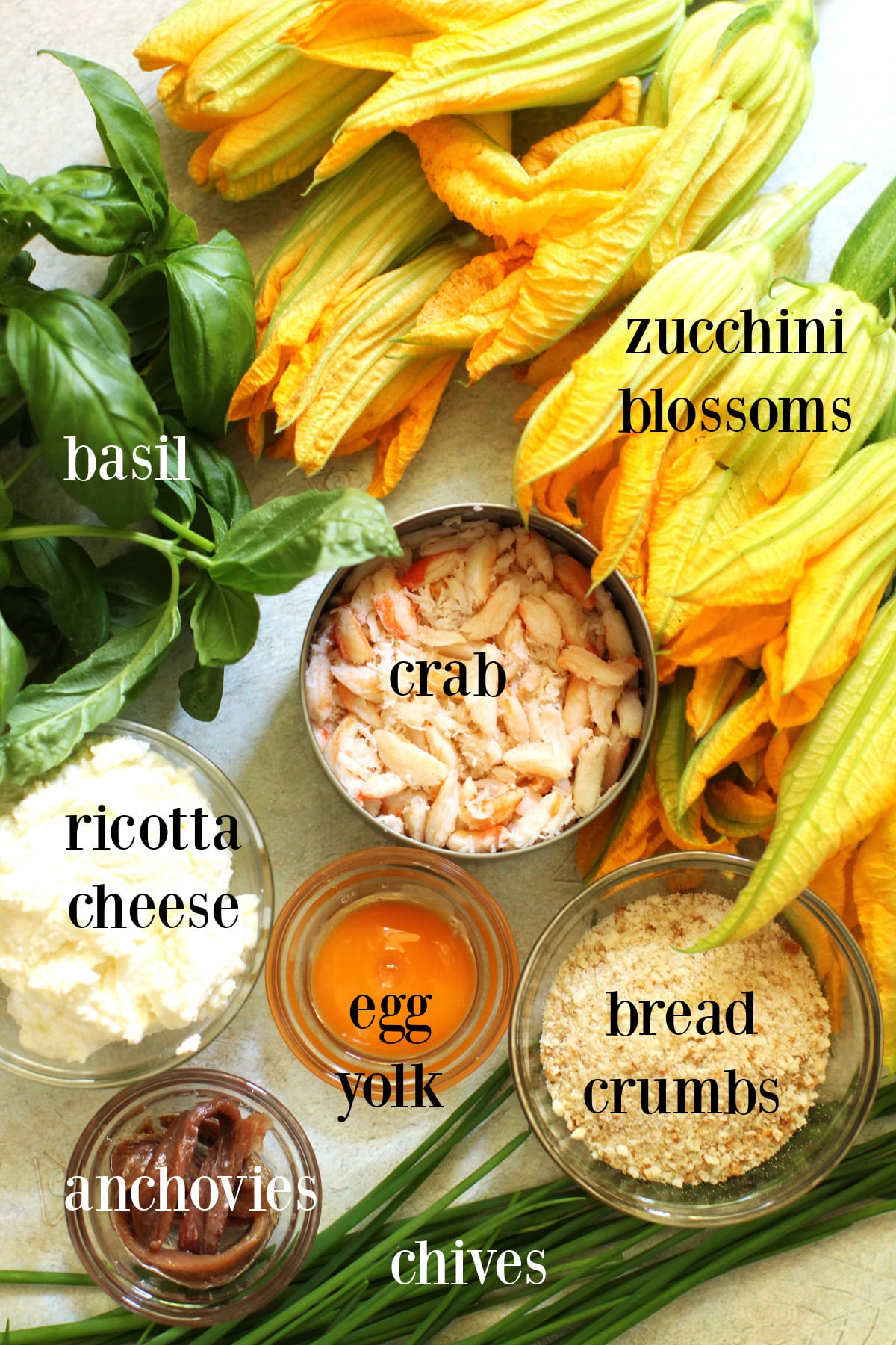 Labeled ingredients for baked stuffed zucchini blossoms.